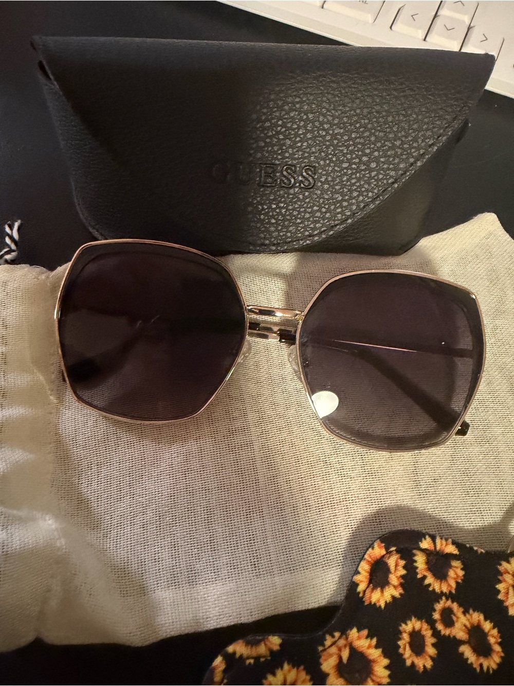 GUESS Gold Frame Sunglasses with Dark Gray Lenses